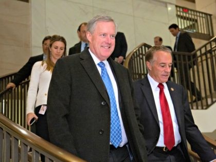 Rep. Mark Meadows, R-N.C., chairman of the conservative House Freedom Caucus, with Rep. Chris Collins, R-N.Y., right, heads into a House Republican strategy meeting with Vice President Mike Pence ahead of President Donald Trump's speech on funding a wall on the US-Mexico border, at the Capitol in Washington, Tuesday, Jan. …