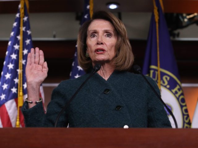 Nancy Pelosi takes the oath (Win McNamee / Getty)