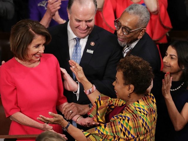 WASHINGTON, DC - JANUARY 3: Members of Congress congratulate newly elected Speaker of the House Nancy Pelosi (D-CA) during the first session of the 116th Congress at the U.S. Capitol January 03, 2019 in Washington, DC. Under the cloud of a partial federal government shutdown, Pelosi reclaimed her former title …