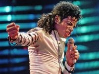 Michael Jackson opens the first of a threee-night concert stay promoting his album "Bad", in Rosemont, Illinois, Tuesday night, April 19, 1988. Jackson will be touring the U.S. and Europe for the next three months. (AP Photo/Mark Elias)