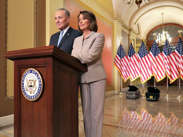 Speaker of the House Nancy Pelosi (D-CA) (R) and Senate Minority Leader Charles Schumer (D-NY) pose for photographs after delivering a televised response to President Donald Trump's national address about border security at the U.S. Capitol January 08, 2019 in Washington, DC. Republicans and Democrats seem no closer to an …