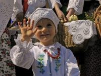 Polish child A Polish child arrives for an Easter Saturday blessing in a church in Bialy Dunajec on April 3, 2010. AFP PHOTO /JANEK SKARZYNSKI (Photo credit should read JANEK SKARZYNSKI/AFP/Getty Images)