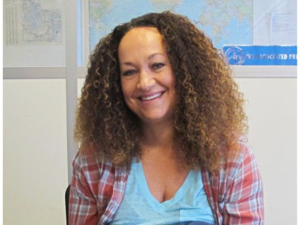 In this March 20, 2017, file photo, Nkechi Diallo, then known as Rachel Dolezal, poses at the bureau of The Associated Press in Spokane, Wash. The former NAACP leader in Washington state, whose life unraveled after she was exposed as a white woman pretending to be black, has pleaded not …