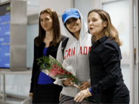 Asylum Seeker Rahaf Mohammed al-Qunun, 18, smiles as she is introduced to the media at Toronto Pearson International Airport, alongside Canadian minister of Foreign Affairs Chrystia Freeland, right, on January 12, 2019 in Toronto, Canada. Al-Qunun, a Saudi Arabian woman who fled her family saying she feared for her life, …