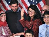 Rashida Tlaib US House Representative Rashida Tlaib (D-MI), wearing a traditional Palestinian robe, takes the oath of office on Thomas Jefferson's English translated Quran, with family members present in a ceremonial swearing-in from Speaker of the House Nancy Pelosi (D-CA) (out of frame) at the start of the 116th Congress at the …
