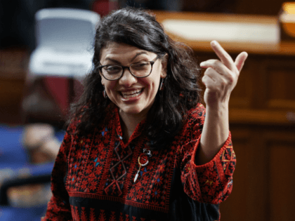 In this Thursday, Jan. 3, 2019 photo, then Rep.-elect Rashida Tlaib of Michigan, is shown on the house floor before being sworn into the 116th Congress at the U.S. Capitol in Washington. Tlaib exclaimed at an event late Thursday that Democrats were going to “impeach the mother------.” According to video …