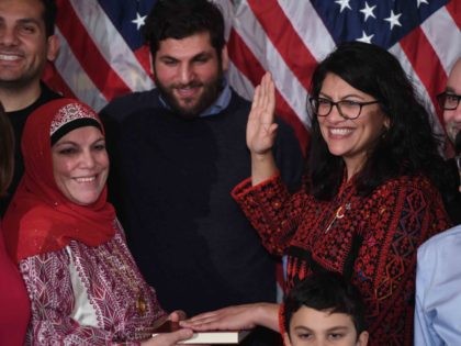 Rashida Tlaib quran koran (Saul Loeb / Getty)