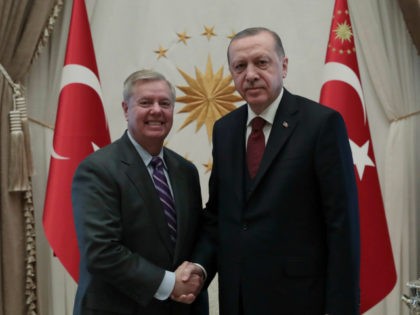 Turkey's President Recep Tayyip Erdogan, right, and U.S. Republican Senator Lindsey Graham