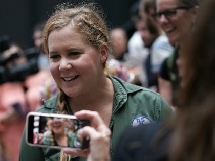 WASHINGTON, DC - OCTOBER 04: Comedian Amy Schumer (C) participates in a protest against the confirmation of Supreme Court nominee Judge Brett Kavanaugh October 4, 2018 at the Hart Senate Office Building on Capitol Hill in Washington, DC. Senators had an opportunity to review a new FBI background investigation into …