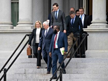Homeland Security Secretary Kirstjen Nielsen, left, Vice President Mike Pence, White House legislative affairs aide Ja'Ron Smith, followed by White House Senior Adviser Jared Kushner, and others, walk down the steps of the Eisenhower Executive Office building, on the White House complex, after a meeting with staff members of House …