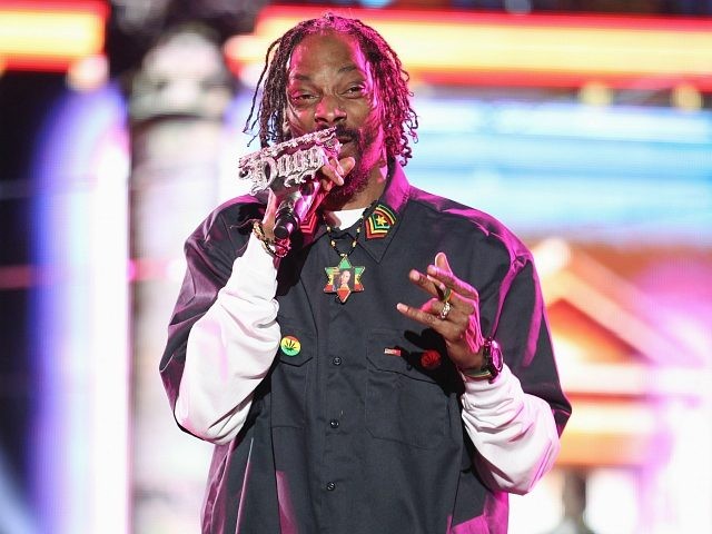 NDIO, CA - APRIL 15: Rapper Snoop Dogg performs onstage during day 3 of the 2012 Coachella