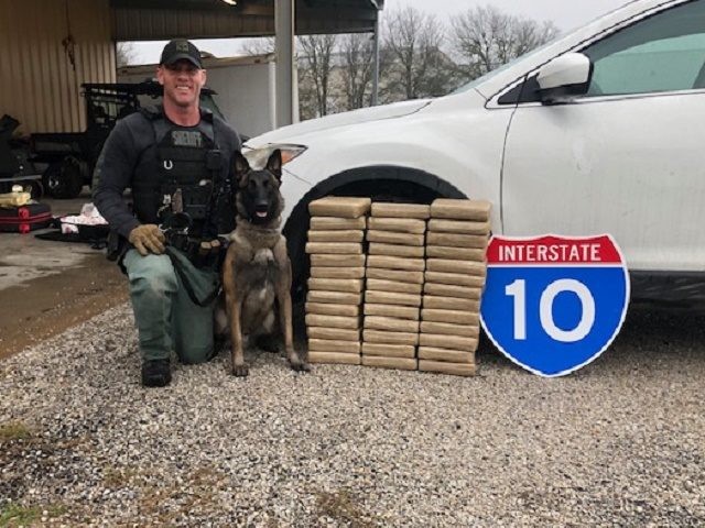 Fayette County Sheriff's Office Sergeant Randy Thumann and Kolt seize $5 million in cocain