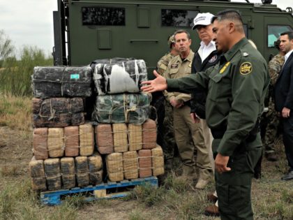 President Donald Trump tours the U.S. border with Mexico at the Rio Grande on the southern