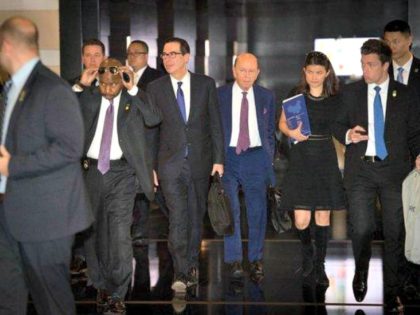 The United States delegation in Beijing for trade talks on Friday included Treasury Secretary Steven Mnuchin, center left, and Commerce Secretary Wilbur Ross, center right.