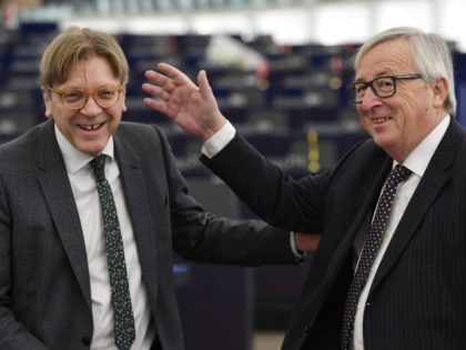 European Commission President Jean-Claude Juncker (R) speaks with European Parliament Brexit chief Guy Verhofstadt prior to a plenary session at the European Parliament on February 6, 2018 in Strasbourg, eastern France. / AFP PHOTO / FREDERICK FLORIN (Photo credit should read FREDERICK FLORIN/AFP/Getty Images)