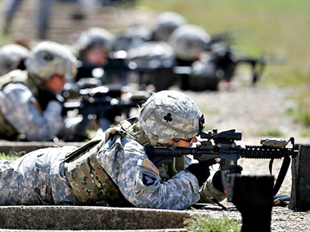 Female soldiers train on a firing range while wearing new body armor in September in Fort