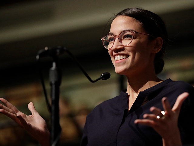 Democrat Alexandria Ocasio-Cortez, who won her bid for a seat in the House of Representatives in New York's 14th Congressional District, at the Kennedy School's Institute of Politics at Harvard University, Thursday, Dec. 6, 2018. (AP Photo/Charles Krupa)