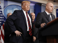 President Donald Trump, left, listens as Brandon Judd, president of the National Border Patrol Council, talks about border security, Thursday Jan. 3, 2019, after making a surprise visit to the press briefing room of the White House in Washington. (AP Photo/Jacquelyn Martin)