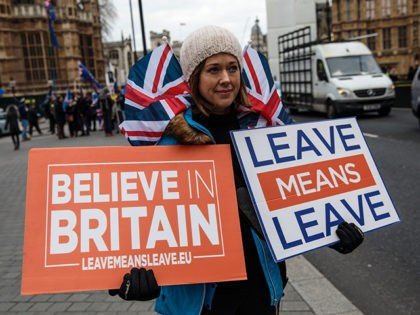 LONDON, ENGLAND - JANUARY 15: Pro-Brexit protesters demonstrate outside the Houses of Parliament on January 15, 2019 in London, England. Theresa May's Brexit deal finally reaches the House of Commons this evening and MPs will begin voting on it at 7pm. The Prime Minister has consistently said her's is the …