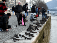 budapest Tourists take pictures at the 'Shoes statue of a memorial place of the Holocaust victims' on the bank of the Danube River in downtown of Budapest on February 7, 2018. Thousands of Hungarians were shot and thrown into the river by the Nazis and the Hungarian Nazis collaborators in 1944. …