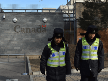 Police patrol outside the Canadian embassy in Beijing on January 15, 2019. - A Chinese court sentenced a Canadian man to death on drug trafficking charges on January 14 after his previous 15-year prison sentence was deemed too lenient, deepening a diplomatic rift as Canadian premier Justin Trudeau accused Beijing …