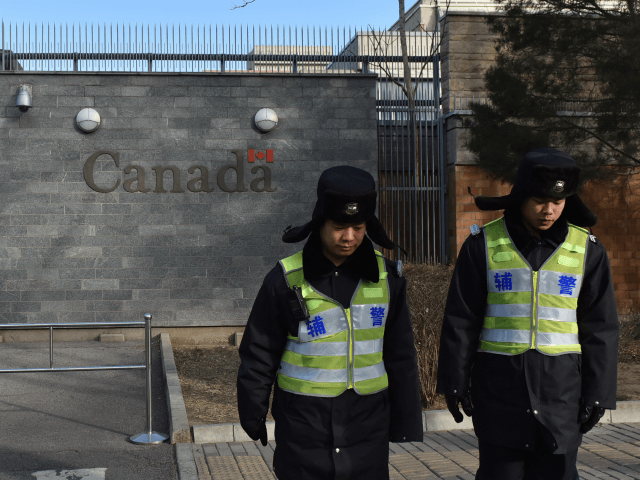 Police patrol outside the Canadian embassy in Beijing on January 15, 2019. - A Chinese cou