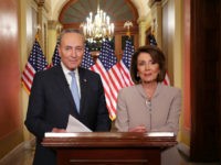 WASHINGTON, DC - JANUARY 08: Speaker of the House Nancy Pelosi (D-CA) (R) and Senate Minority Leader Charles Schumer (D-NY) pose for photographs after delivering a televised response to President Donald Trump's national address about border security at the U.S. Capitol January 08, 2019 in Washington, DC. Republicans and Democrats …