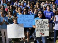 crowd-defund-planned-parenthood-abortion-file-photo-ap Anti-abortion activists rally on the steps of the Texas Capitol to condemn the use in medical research of tissue samples from aborted fetuses, Tuesday, July 28, 2015, in Austin, Texas. (AP Photo/Eric Gay)