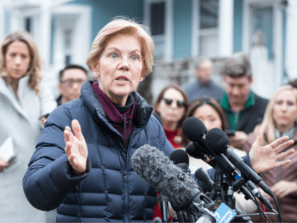 Sen. Elizabeth Warren (D-MA), addresses the media outside of her home after announcing she formed an exploratory committee for a 2020 Presidential run on December 31, 2018 in Cambridge, Massachusetts. Warren is one of the earliest potential candidates to make an official announcement in what is expected to be a …