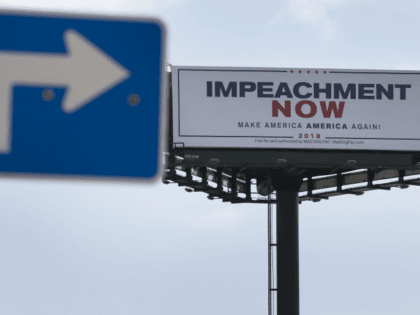 MARCH 19: A billboard reading: 'Impeachment Now Make America America Again!' calling for P