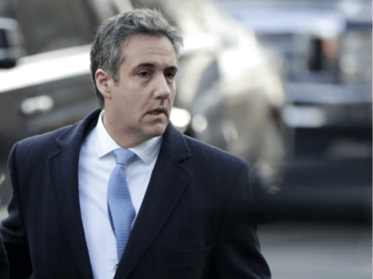 Michael Cohen, right, President Donald Trump's former lawyer, arrives at federal court wit