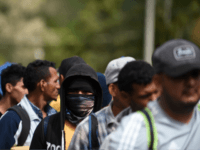 Honduran migrants heading to the United States with a second caravan wait in Agua Caliente, Chiquimula region, Guatemala, on the Honduras-Guatemala border on January 16, 2019. - Hundreds of Hondurans have set out on a trek to the United States, forming another caravan, which US President Donald Trump cited Tuesday …