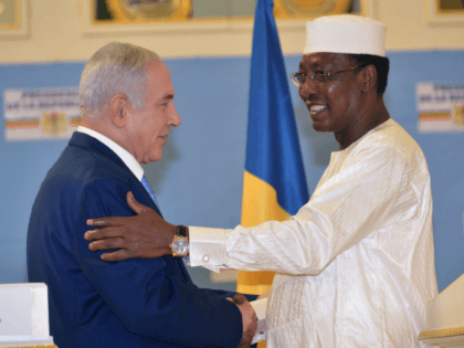 Chadian President Idriss Deby Itno (R) shakes hands with Israeli Prime Minister Benjamin Netanyahu during a meeting at the presidential palace in N'Djamena on January 20, 2019. - Israel and Chad have renewed diplomatic ties decades after they were ruptured, Israel's prime minister announced on January 20 during a visit …