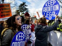 pro-choice-activists-march-for-life-2015-washington-dc-getty Pro-choice activists block the road against US Capitol Police, who are escorting the March For Life's path, in front of the US Supreme Court in Washington, DC, January 22, 2015. Tens of thousands of Americans who oppose abortion are in Washington for the annual March for Life, marking the 42nd …