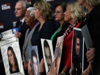 secure-our-border-angel-families-illegal-immigration-618-getty WASHINGTON, DC - JUNE 22: Family members hold portraits of their deceased loved ones that were signed by President Donald Trump during an event with 'Angel Families' June 22, 2018 at the South Court Auditorium of Eisenhower Executive Office Building in Washington, DC. President Trump hosted an event to discuss …