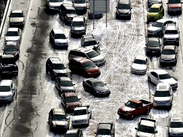 In this Jan. 29, 2014 aerial file photo, abandoned cars at I-75 headed northbound near the