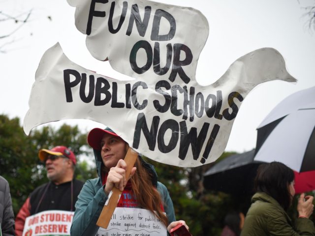 teachers strike fund our public schools (Robyn Beck / AFP / Getty)