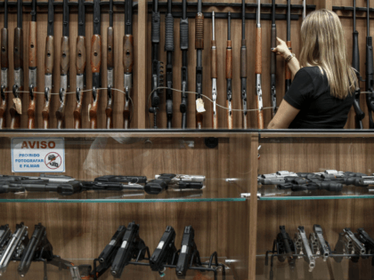 View inside a gun shop in Sao Paulo, Brazil on January 15, 2019. - Brazil's far-right President Jair Bolsonaro decreed the easing of national gun laws as part of his law-and-order agenda, despite fears it could aggravate already staggering violent crime. (Photo by Miguel SCHINCARIOL / AFP) (Photo credit should …