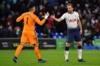 Too good: Cardiff's English-born Filipino goalkeeper Neil Etheridge congratulates Tottenham striker Harry Kane