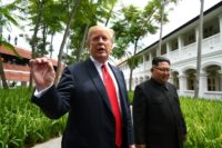 US President Donald Trump says he wants a new meeting with North Korea's leader Kim Jong Un, both seen in this file image at their landmark summit in Singapore