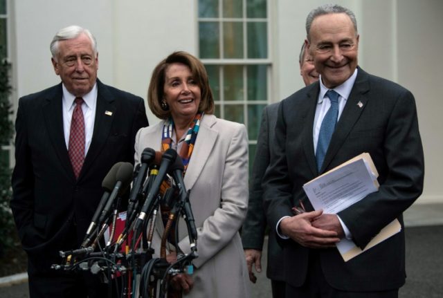 Nancy Pelosi (C) is poised to wield the gavel once again as speaker of the US House of Representatives when Democrats regain control of the chamber on January 3, 2019 It's official: divided government arrives on Capitol Hill