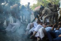Protests broke out after police escorted two women into a flashpoint temple in the southern Indian state of Kerala on Wednesday