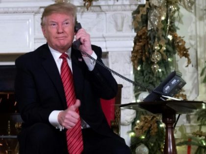 On Christmas Eve, Trump questions child about belief in Santa