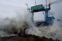 Meteorologists said Pabuk, the first tropical storm in decades to strike during the peak holiday season, made landfall in southern Thailand on Friday afternoon