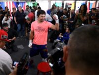 Manny Pacquiao jokes with reporters ahead of his January 19 fight with Adrien Broner in Las Vegas