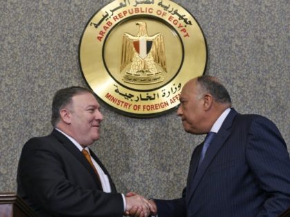 US Secretary of State Mike Pompeo shakes hands after holding a press conference with Egyptian Foreign Minister Sameh Shoukry at the ministry of foreign affairs in Cairo