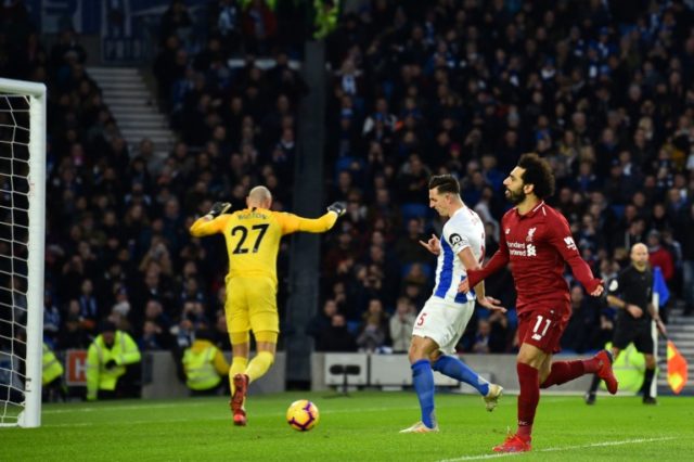 Salah penalty sends 'mature' Liverpool seven points clear again