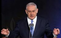 Israeli Prime Minister Benjamin Netanyahu speaks during a handover ceremony for the new chief of staff on January 15, 2019 in Tel Aviv Netanyahu tells Iran to get out of Syria 'fast'
