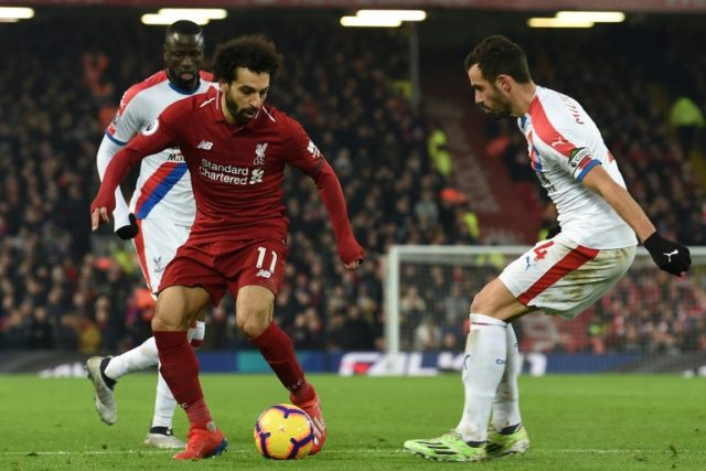 Salah fires Liverpool seven points clear, Arsenal rock Chelsea