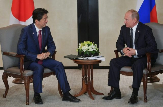 Putin, Abe hold summit to break island impasse